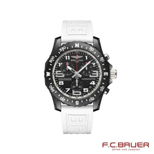 Die Breitling - Professional Endurance Pro x82310a71b1s1-weiss-11555981 ist eine elegante schwarze Chronographen-Armbanduhr mit weißem Gummiarmband und einem detaillierten Zifferblatt mit mehreren Zifferblättern und Markierungen. Die Uhr verfügt über eine drehbare Lünette mit Navigationsmarkierungen. Der renommierte Markenname und das Logo „Breitling“ sind auf dem Zifferblatt deutlich zu sehen, neben „F.C. BAUER“ in der unteren rechten Ecke, was auf die Verbindung mit Juwelier Bauer in München hinweist.